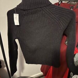 Black Ribbed Turtleneck Sweater